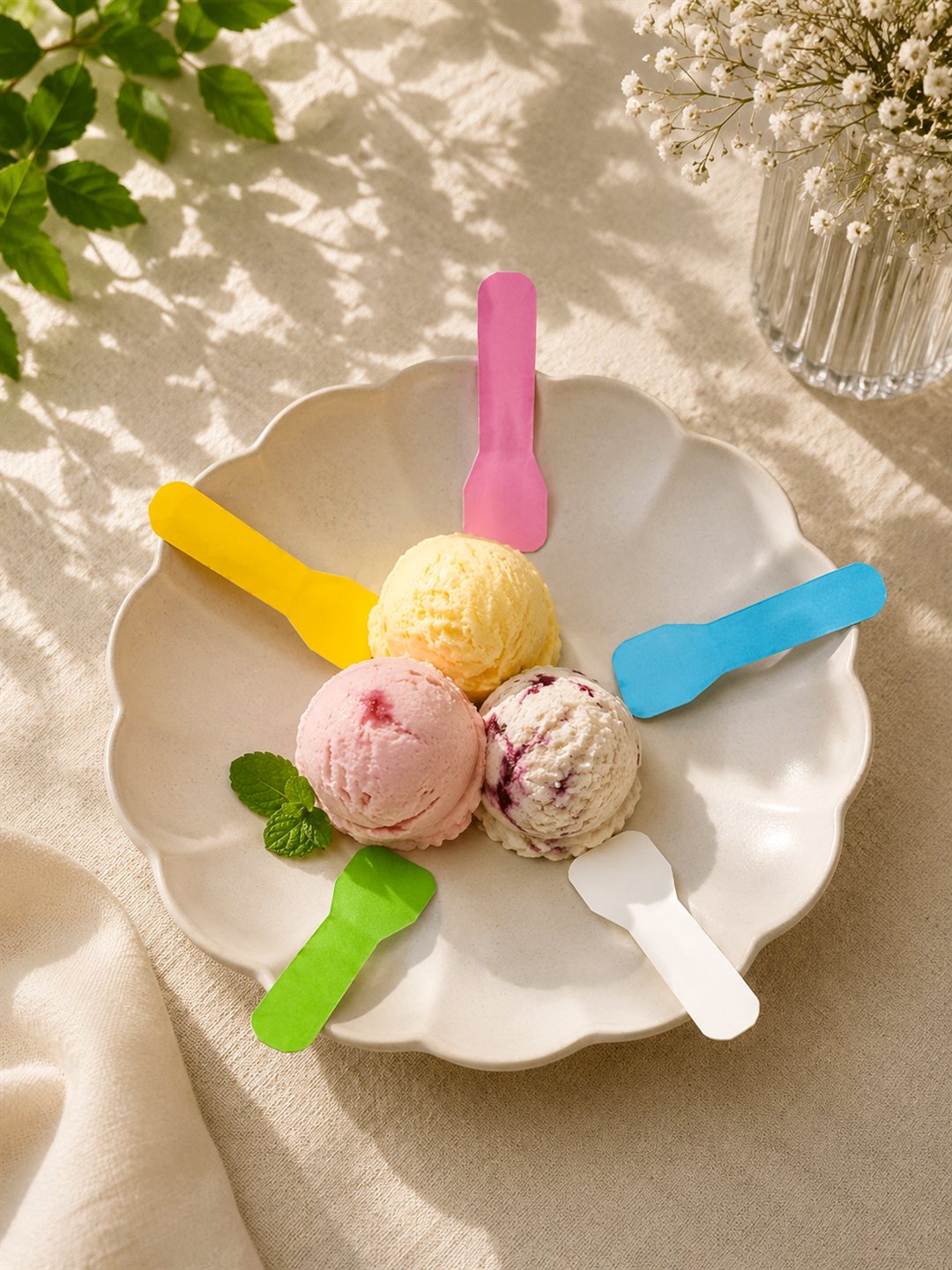 Paper taster spoons in custom brand colours with ice cream